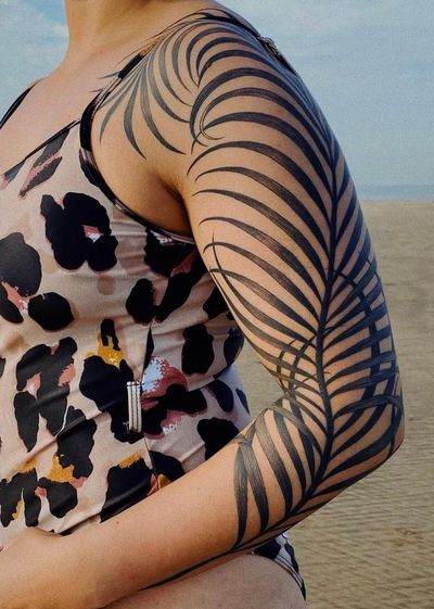 Palm leaf around upper arm