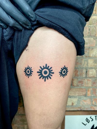 Ornamental suns engraved 